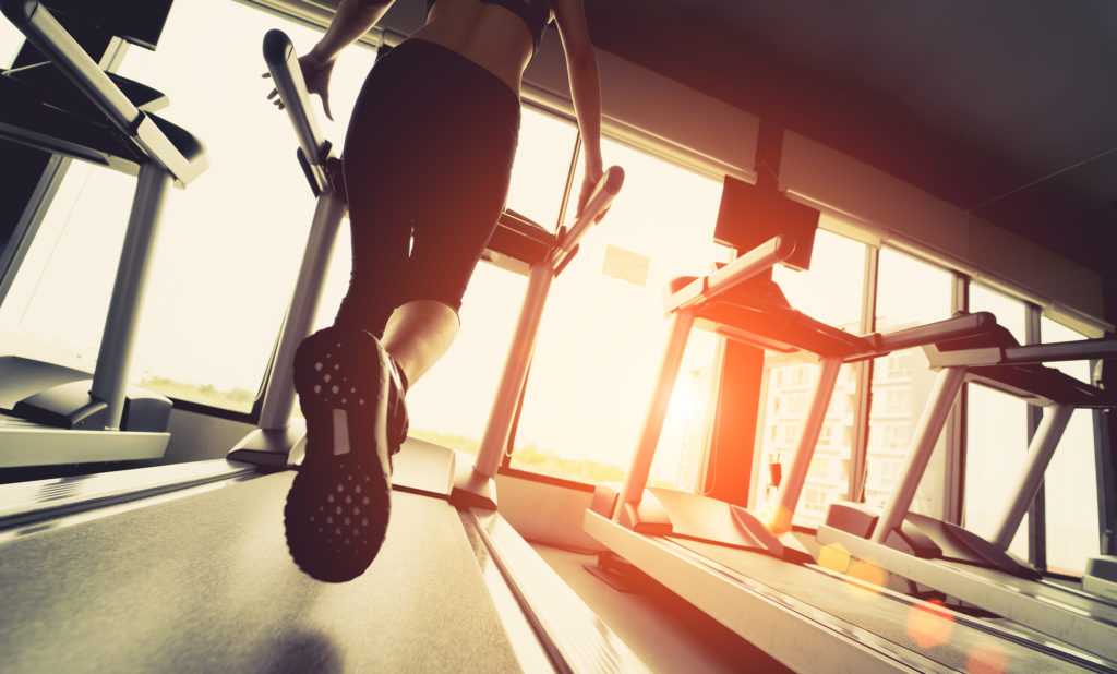 Woman exercising on treadmill