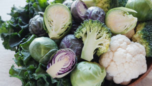 Cruciferous vegetables, including cauliflower, broccoli, Brussels sprouts, cabbage, and kale.
