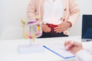 Elderly woman Patient consultation with doctor for Colon disease, Large Intestine, Colorectal cancer, Ulcerative colitis, Diverticulitis, Irritable bowel syndrome, Digestive system and Healthcare